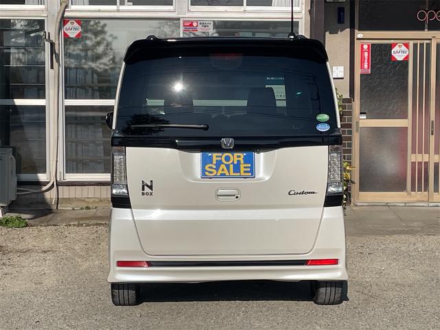 N-BOXカスタム 2トーンカラースタイル G・ターボLパッケージ 衝突軽減ブレーキ 両側パワースライド バックカメラ 純正ナビ フルセグTV オートクルーズ LEDフォグ ダウンサス 純正15AW パドルシフト 革巻きステアリング カーテン・サイドエアバック(51枚目)