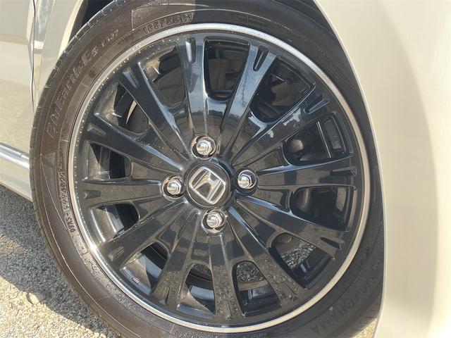 N-BOXカスタム 2トーンカラースタイル G・ターボLパッケージ 衝突軽減ブレーキ 両側パワースライド バックカメラ 純正ナビ フルセグTV オートクルーズ LEDフォグ ダウンサス 純正15AW パドルシフト 革巻きステアリング カーテン・サイドエアバック(55枚目)