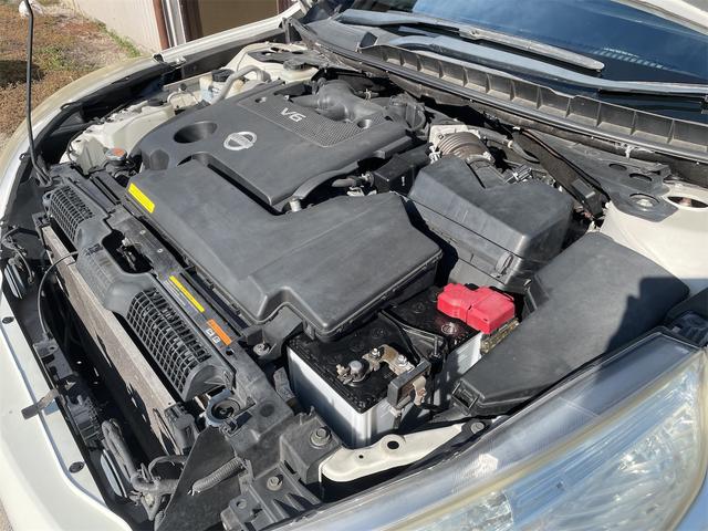 ティアナ ２５０ＸＶ　ＯＰベンチレーション付き黒本革シート　サイド＆バックカメラ　純正ナビ　フルセグＴＶ　ＥＴＣ　２メモリー付パワーシート　電動オットマン　リバース連動ドアミラー　ＵＳＢ＆ＶＴＲ端子　木目調パネル（40枚目）