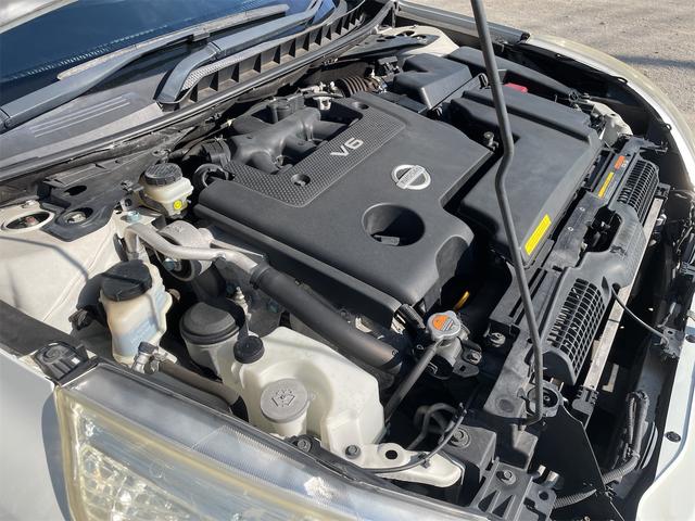 ティアナ ２５０ＸＶ　ＯＰベンチレーション付き黒本革シート　サイド＆バックカメラ　純正ナビ　フルセグＴＶ　ＥＴＣ　２メモリー付パワーシート　電動オットマン　リバース連動ドアミラー　ＵＳＢ＆ＶＴＲ端子　木目調パネル（42枚目）