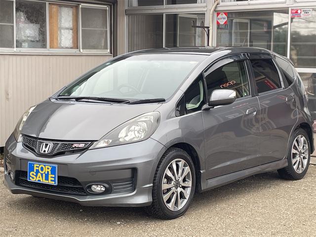 フィット ＲＳ　６速ＭＴ　前後ドライブレコーダー　バックカメラ　純正ナビＴＶ　ＥＴＣ　スマートキー　ＯＰフットイルミ　フロント熱線入りガラス　純正１６ＡＷ　オート付ＨＩＤライト　フォグ　ウィンカーミラー　横滑り防止（48枚目）