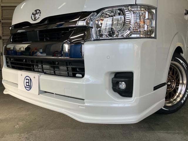 ハイエースワゴン ＧＬ　ガレナシート　限定１７インチＭ１ＨＣ　１１型ナビ　登録済未使用車　フリップダウンモニター　２インチローダウン　４１５コブラタイプＲフロントリップ　パノラマビュー　パワースライドドア　ＬＥＤヘッドライト（10枚目）