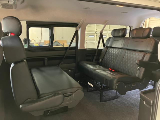 ハイエースワゴン ＧＬ　ガレナシート　限定１７インチＭ１ＨＣ　１１型ナビ　登録済未使用車　フリップダウンモニター　２インチローダウン　４１５コブラタイプＲフロントリップ　パノラマビュー　パワースライドドア　ＬＥＤヘッドライト（32枚目）