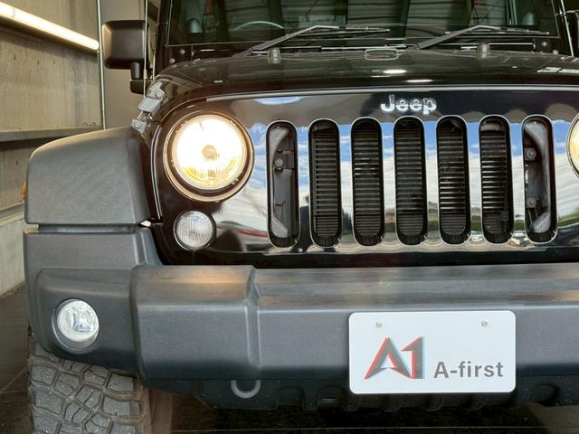 ジープ・ラングラーアンリミテッド スポーツ 後期 ロックスター17インチアルミ ナビ バックカメラ サイドカメラ Bluetooth フルセグTV 後席モニター クルーズコントロール ドライブレコーダー ETC オートエアコン(4枚目)