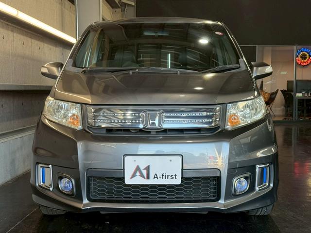 フリードスパイクハイブリッド ジャストセレクション 純正ナビ 両側電動スライドドア バックカメラ ETC オートエアコン HIDヘッドライト オートライト TV 電動格納ミラー クルーズコントロール 純正15インチアルミホイール 横滑り防止装置(8枚目)