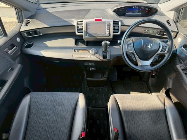 フリードスパイクハイブリッド ジャストセレクション 純正ナビ 両側電動スライドドア バックカメラ ETC オートエアコン HIDヘッドライト オートライト TV 電動格納ミラー クルーズコントロール 純正15インチアルミホイール 横滑り防止装置(15枚目)