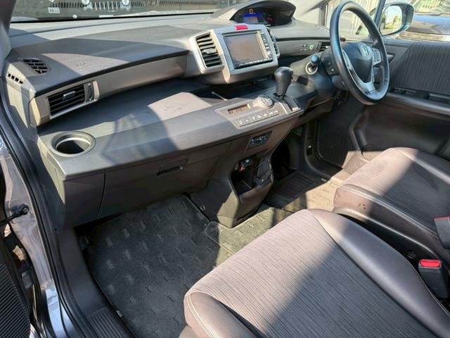 フリードスパイクハイブリッド ジャストセレクション 純正ナビ 両側電動スライドドア バックカメラ ETC オートエアコン HIDヘッドライト オートライト TV 電動格納ミラー クルーズコントロール 純正15インチアルミホイール 横滑り防止装置(19枚目)