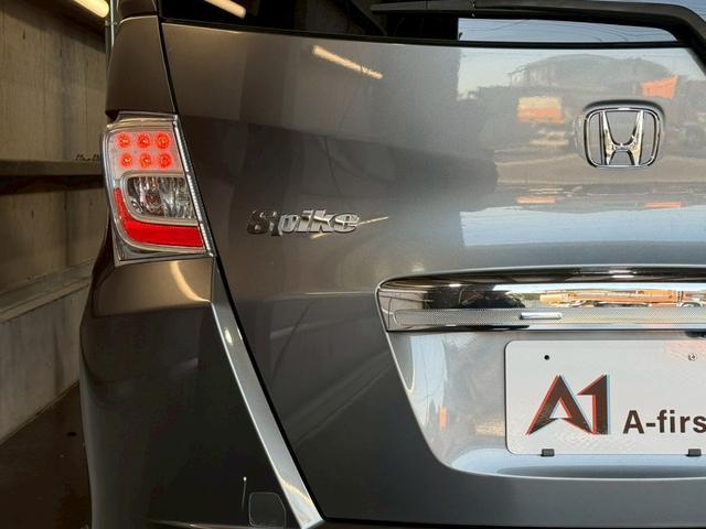 フリードスパイクハイブリッド ジャストセレクション 純正ナビ 両側電動スライドドア バックカメラ ETC オートエアコン HIDヘッドライト オートライト TV 電動格納ミラー クルーズコントロール 純正15インチアルミホイール 横滑り防止装置(42枚目)