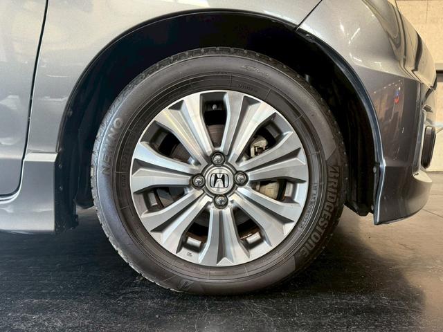 フリードスパイクハイブリッド ジャストセレクション 純正ナビ 両側電動スライドドア バックカメラ ETC オートエアコン HIDヘッドライト オートライト TV 電動格納ミラー クルーズコントロール 純正15インチアルミホイール 横滑り防止装置(44枚目)