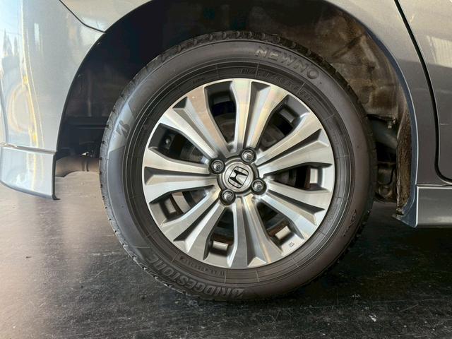 フリードスパイクハイブリッド ジャストセレクション 純正ナビ 両側電動スライドドア バックカメラ ETC オートエアコン HIDヘッドライト オートライト TV 電動格納ミラー クルーズコントロール 純正15インチアルミホイール 横滑り防止装置(45枚目)