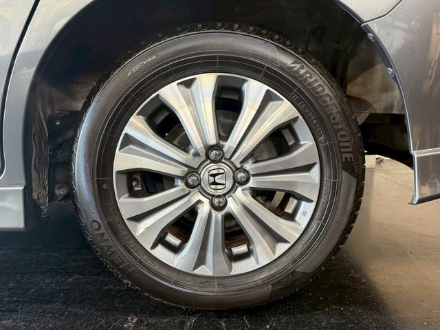 フリードスパイクハイブリッド ジャストセレクション 純正ナビ 両側電動スライドドア バックカメラ ETC オートエアコン HIDヘッドライト オートライト TV 電動格納ミラー クルーズコントロール 純正15インチアルミホイール 横滑り防止装置(47枚目)