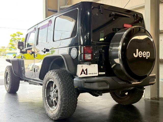 ジープ・ラングラーアンリミテッド サハラ　禁煙車　背面タイヤハードカバー　ナビ　１８インチアルミ　バックカメラ　サイドカメラ　前後ルビコンタイプスチールバンパー　社外フラットフェンダー　レザー調シートカバー　クルーズコントロール　ＥＴＣ（17枚目）