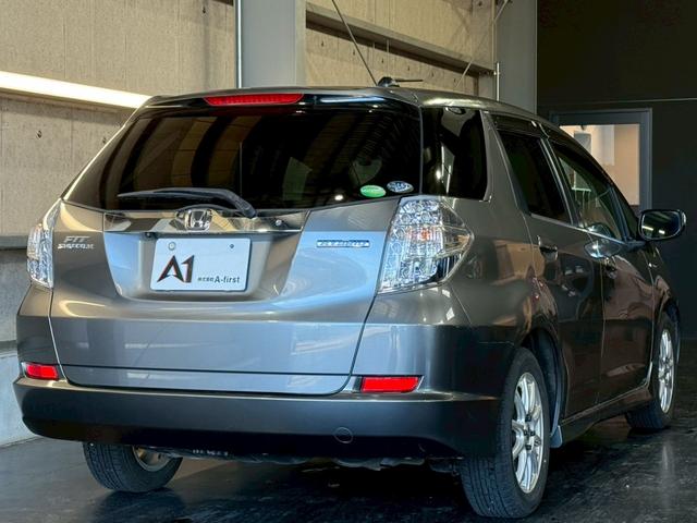 フィットシャトルハイブリッド ハイブリッド・スマートセレクション　純正ナビ　バックカメラ　ＥＴＣ　ハーフレザーシート　クルーズコントロール　フルセグＴＶ　Ｂｌｕｅｔｏｏｔｈ　スマートキー　電動格納ミラー　オートライト　フロントフォグランプ　１５インチアルミ（11枚目）