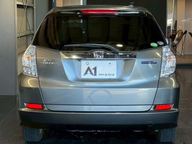 フィットシャトルハイブリッド ハイブリッド・スマートセレクション　純正ナビ　バックカメラ　ＥＴＣ　ハーフレザーシート　クルーズコントロール　フルセグＴＶ　Ｂｌｕｅｔｏｏｔｈ　スマートキー　電動格納ミラー　オートライト　フロントフォグランプ　１５インチアルミ（12枚目）