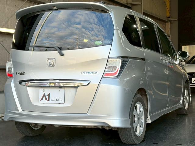フリードハイブリッド ジャストセレクション　６人乗り　カロッツェリアナビ　電動スライドドア　バックカメラ　ＴＶ　Ｂｌｕｅｔｏｏｔｈ　ドライブレコーダー　クルーズコントロール　ＥＴＣ　スマートキー　オートライト　電動格納ミラー　オートエアコン（10枚目）