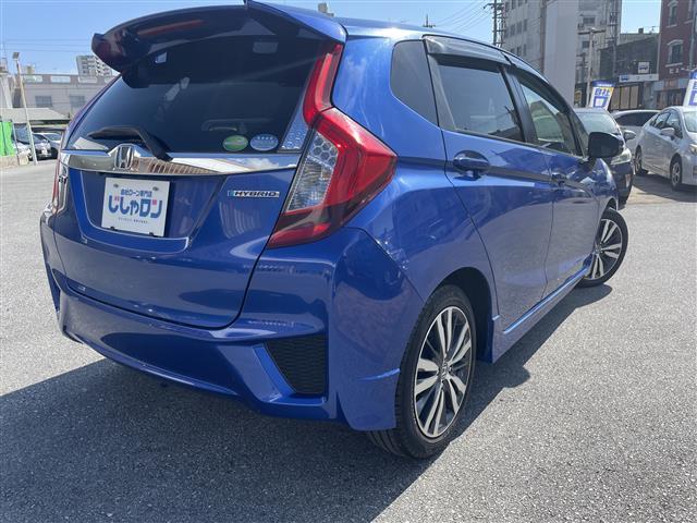 フィットハイブリッド Ｓパッケージ　本土仕入　純正ナビ　フルセグＴＶ　Ｂｌｕｅｔｏｏｔｈ接続　バックカメラ　ＣＤ／ＤＶＤ再生　クルーズコントロール　アイドリングストップ　オートライト　プッシュスタート　スマートキー　スペアキー（28枚目）