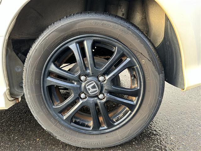 N-BOXカスタム 2トーンカラースタイル G・Aパッケージ 社外ナビ フルセグTV ドアバイザー ステアリングリモコン 革巻きステアリング オートライト 片側パワースライドドア プッシュスタート(34枚目)