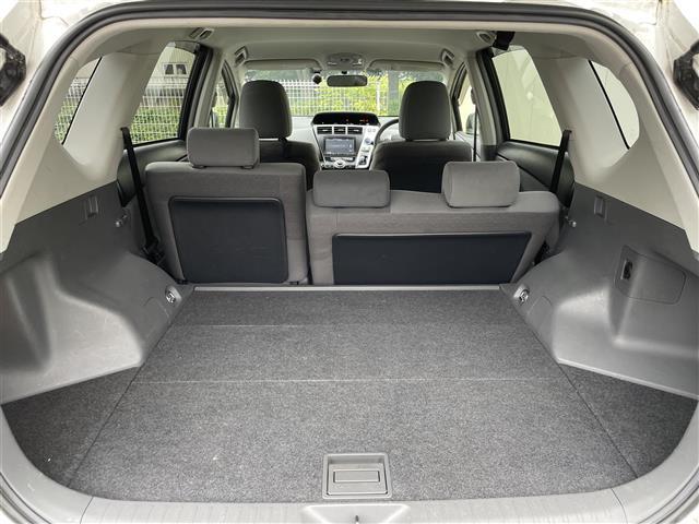 プリウスアルファ Ｓ　禁煙車／純正ナビ／ドアバイザー／ステアリングリモコン／ＥＴＣ／カーテンエアバック／オートエアコン／プッシュスタート（23枚目）