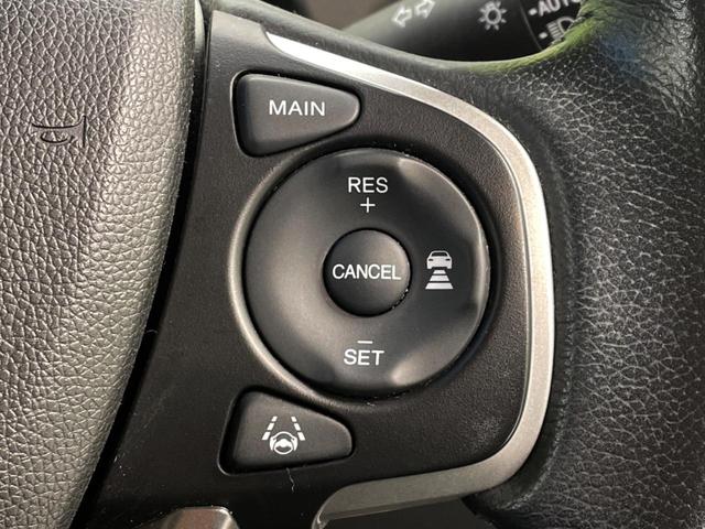 フリード Ｇ・ホンダセンシング　両側電動ドア　純正９インチナビ　バックカメラ　寒冷地仕様　ホンダセンシング　レーダークルーズ　禁煙車　ハーフレザーシート　ドラレコ　スマートキー　ＬＥＤヘッド　ビルトインＥＴＣ　純正１５インチアルミ（4枚目）