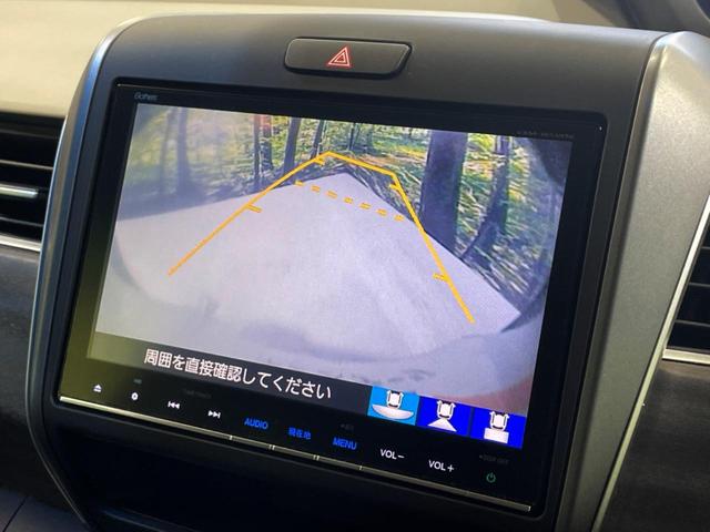 フリード Ｇ・ホンダセンシング　両側電動ドア　純正９インチナビ　バックカメラ　寒冷地仕様　ホンダセンシング　レーダークルーズ　禁煙車　ハーフレザーシート　ドラレコ　スマートキー　ＬＥＤヘッド　ビルトインＥＴＣ　純正１５インチアルミ（8枚目）