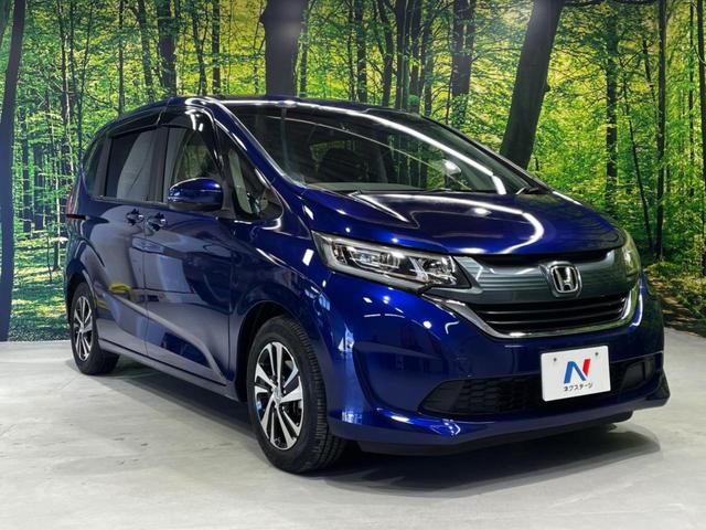 フリード Ｇ・ホンダセンシング　両側電動ドア　純正９インチナビ　バックカメラ　寒冷地仕様　ホンダセンシング　レーダークルーズ　禁煙車　ハーフレザーシート　ドラレコ　スマートキー　ＬＥＤヘッド　ビルトインＥＴＣ　純正１５インチアルミ（35枚目）