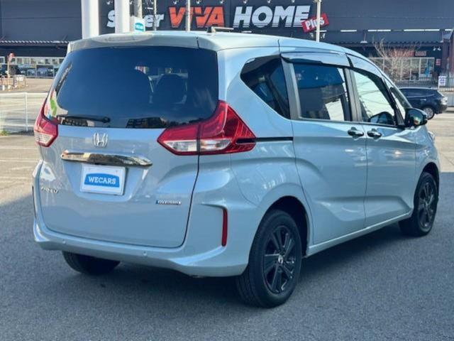 フリードハイブリッド 4WDハイブリッドGブラックスタイル 新品タイヤ/保証書/純正 9インチ SDナビ/フリップダウンモニター 純正 10.1インチ/ホンダセンシング/両側電動スライドドア/シートヒーター 前席/車線逸脱防止支援システム 衝突被害軽減システム(3枚目)