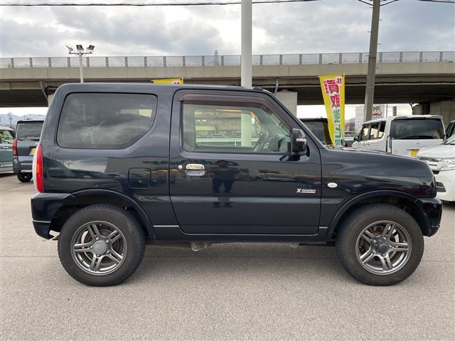 ジムニー クロスアドベンチャー　社外ナビ　ワンセグＴＶ　キーレス　４ＷＤ　ターボ　電動ミラー　純正アルミホイール　スタッドレス＆ＡＷ積み込み（16枚目）