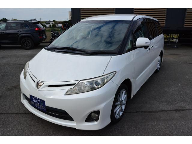 エスティマ 2.4アエラス Gエディション フリップダウンモニター 両側電動スライドドア スマートキー プッシュスタート HDDナビ Bluetoothオーディオ ミュージックサーバー バックカメラ クルーズコントロール オットマンシート(2枚目)