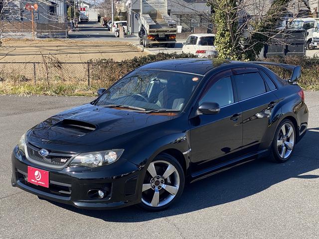 ＷＲＸ　ＳＴｉ　修復歴無　２Ｌターボ・３０８馬力　６速Ｍ／Ｔ　社外ディスプレイオーディオ　ＤＶＤ　ＵＳＢ　ＥＴＣ　ハーフレザーパワーシート　スマートキー　ＨＩＤライト＆フォグ　リヤウィング　純正１８アルミ(2枚目)