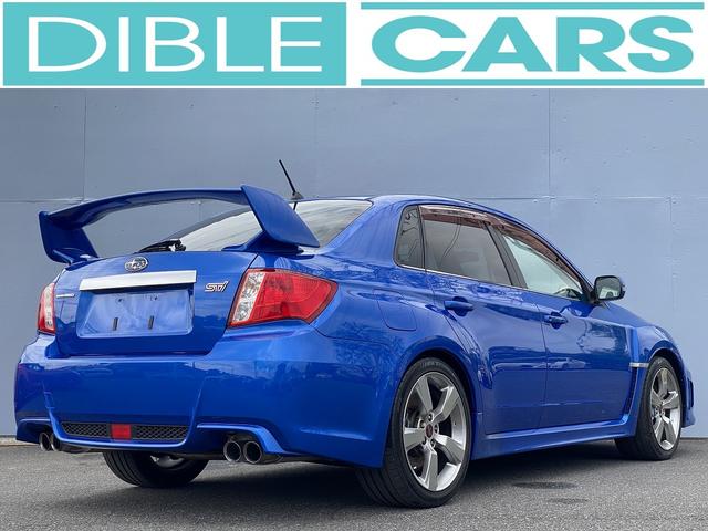 インプレッサ ＷＲＸ　ＳＴｉ　１年保障付　ノーマル車　６ＭＴ　カロッツェリアナビ　ＥＴＣ　スマートキー　プッシュスタート　ＡＰＥＸＩブースト計　ハーフレザーシート　パワーシート　ＨＩＤヘッドライト　純正大型リアスポイラー（4枚目）