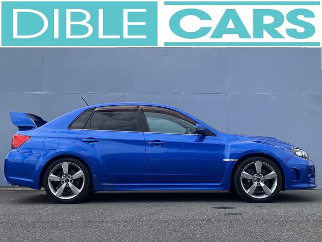 インプレッサ ＷＲＸ　ＳＴｉ　１年保障付　ノーマル車　６ＭＴ　カロッツェリアナビ　ＥＴＣ　スマートキー　プッシュスタート　ＡＰＥＸＩブースト計　ハーフレザーシート　パワーシート　ＨＩＤヘッドライト　純正大型リアスポイラー（6枚目）