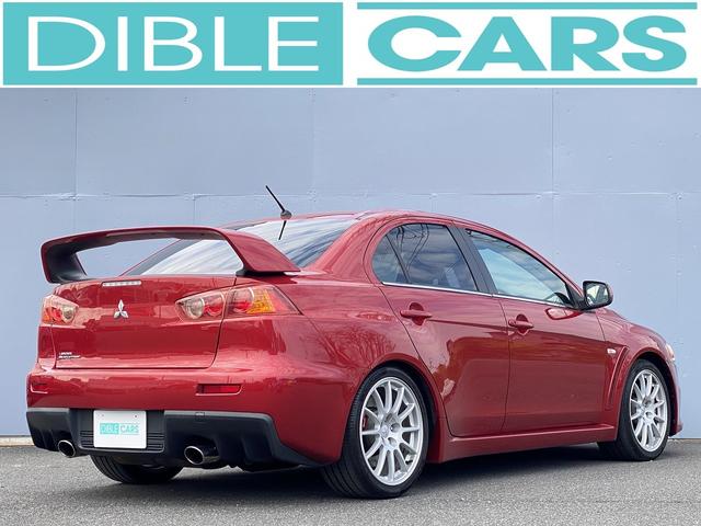 ランサー ＧＳＲエボリューションＸ　１年保証付　修復歴無し　ワンオーナー　禁煙車　走行距離６０，５００ｋｍ　５ＭＴ　ＨＫＳ車高調　ＲＥＣＡＲＯシート　大型リヤスポイラー　ナビＴＶ　革巻きステアリング　純正１８ＡＷ　キーレス　ＨＩＤライト（6枚目）