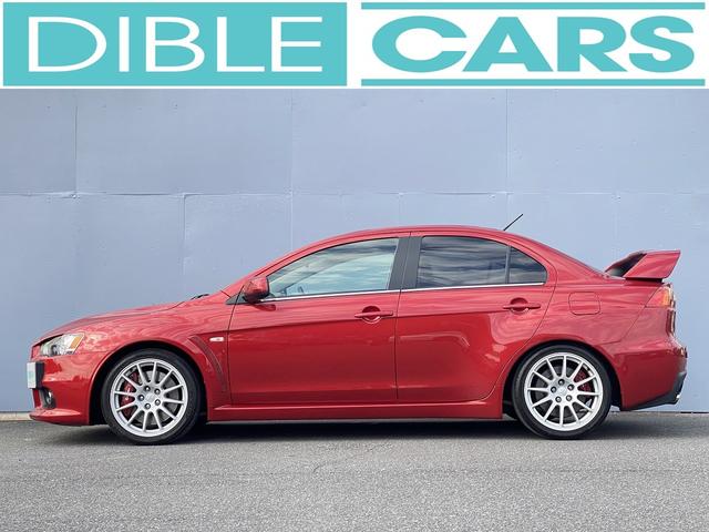 ランサー ＧＳＲエボリューションＸ　１年保証付　修復歴無し　ワンオーナー　禁煙車　走行距離６０，５００ｋｍ　５ＭＴ　ＨＫＳ車高調　ＲＥＣＡＲＯシート　大型リヤスポイラー　ナビＴＶ　革巻きステアリング　純正１８ＡＷ　キーレス　ＨＩＤライト（7枚目）