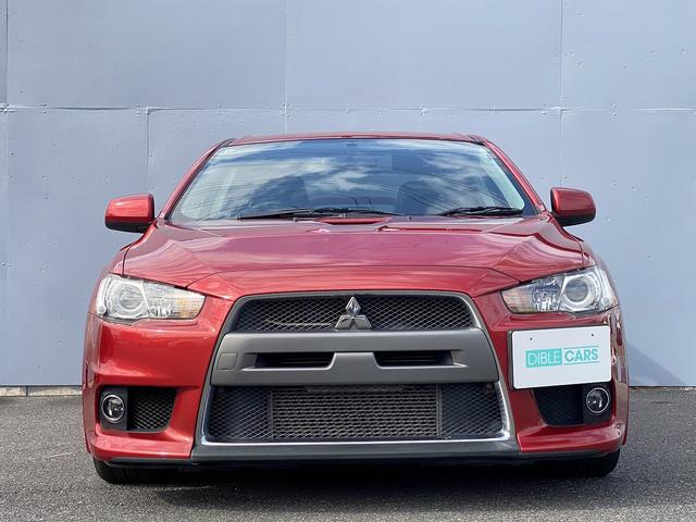 ランサー ＧＳＲエボリューションＸ　１年保証付　修復歴無し　ワンオーナー　禁煙車　走行距離６０，５００ｋｍ　５ＭＴ　ＨＫＳ車高調　ＲＥＣＡＲＯシート　大型リヤスポイラー　ナビＴＶ　革巻きステアリング　純正１８ＡＷ　キーレス　ＨＩＤライト（9枚目）