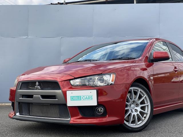 ランサー ＧＳＲエボリューションＸ　１年保証付　修復歴無し　ワンオーナー　禁煙車　走行距離６０，５００ｋｍ　５ＭＴ　ＨＫＳ車高調　ＲＥＣＡＲＯシート　大型リヤスポイラー　ナビＴＶ　革巻きステアリング　純正１８ＡＷ　キーレス　ＨＩＤライト（28枚目）