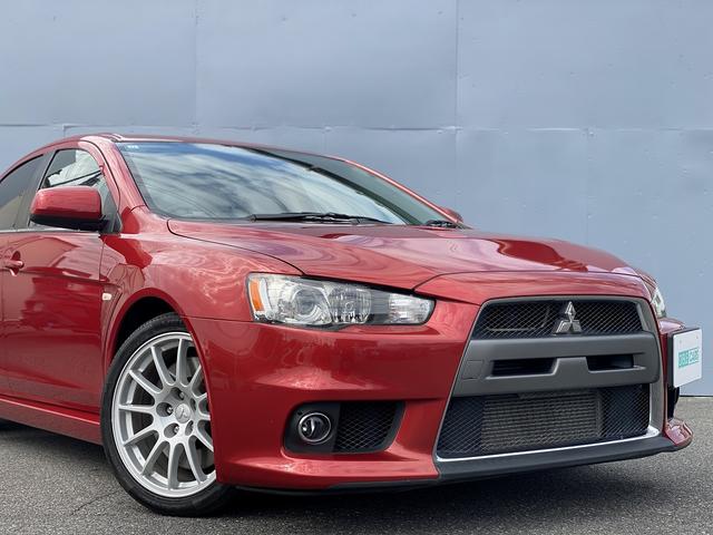 ランサー ＧＳＲエボリューションＸ　１年保証付　修復歴無し　ワンオーナー　禁煙車　走行距離６０，５００ｋｍ　５ＭＴ　ＨＫＳ車高調　ＲＥＣＡＲＯシート　大型リヤスポイラー　ナビＴＶ　革巻きステアリング　純正１８ＡＷ　キーレス　ＨＩＤライト（29枚目）