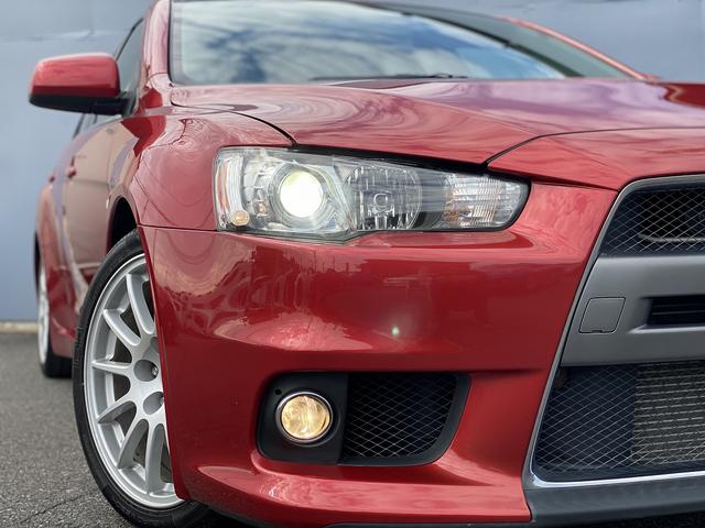 ランサー ＧＳＲエボリューションＸ　１年保証付　修復歴無し　ワンオーナー　禁煙車　走行距離６０，５００ｋｍ　５ＭＴ　ＨＫＳ車高調　ＲＥＣＡＲＯシート　大型リヤスポイラー　ナビＴＶ　革巻きステアリング　純正１８ＡＷ　キーレス　ＨＩＤライト（31枚目）