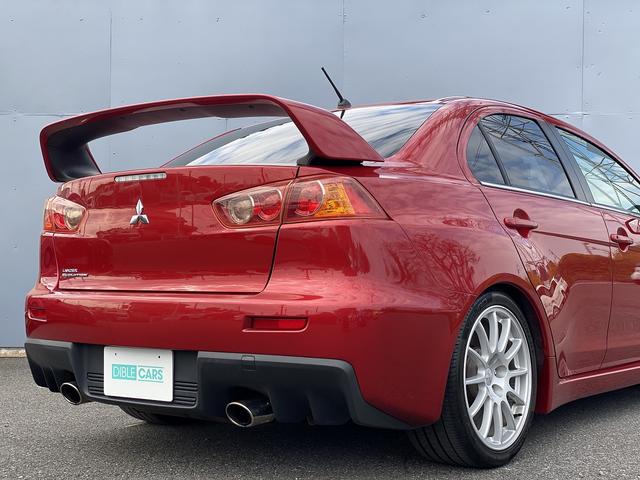 ランサー ＧＳＲエボリューションＸ　１年保証付　修復歴無し　ワンオーナー　禁煙車　走行距離６０，５００ｋｍ　５ＭＴ　ＨＫＳ車高調　ＲＥＣＡＲＯシート　大型リヤスポイラー　ナビＴＶ　革巻きステアリング　純正１８ＡＷ　キーレス　ＨＩＤライト（49枚目）