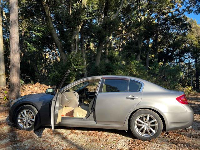 スカイライン 250GT タイプP ETC ナビ アルミホイール オートライト HID AT シートヒーター キーレスエントリー 盗難防止システム パワーシート CD DVD再生 衝突安全ボディ ABS ESC エアコン(26枚目)