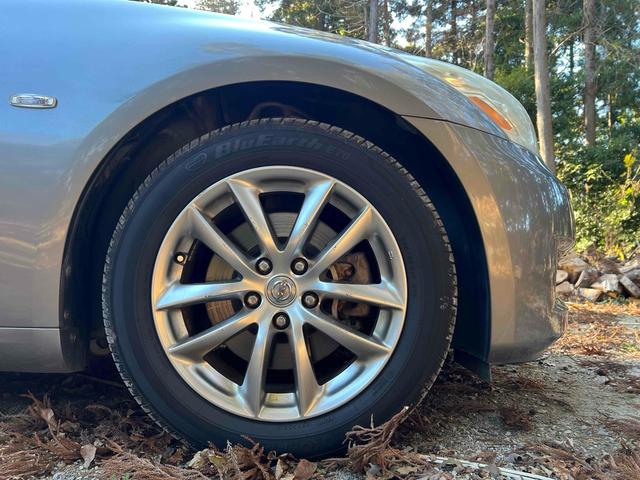 スカイライン 250GT タイプP ETC ナビ アルミホイール オートライト HID AT シートヒーター キーレスエントリー 盗難防止システム パワーシート CD DVD再生 衝突安全ボディ ABS ESC エアコン(34枚目)