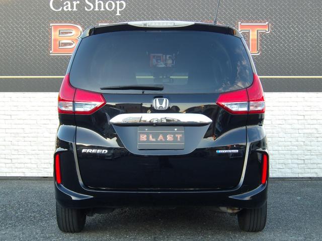 フリードハイブリッド ハイブリッド・ＥＸ　ハーフレザー　フリップダウンモニター　純正メモリナビ　バックカメラ　シートヒーター　両側パワースライドドア　前後ドラレコ　ビルトインＥＴＣ　オートライト　純正１５ＡＷ　ＬＥＤヘッドライト　スマートキー（6枚目）