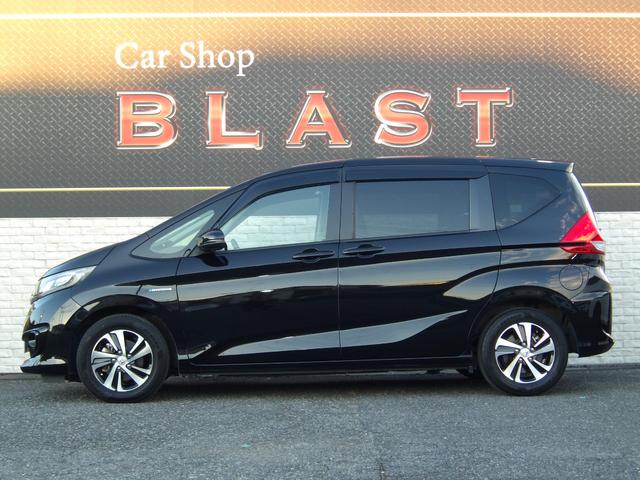 フリードハイブリッド ハイブリッド・ＥＸ　ハーフレザー　フリップダウンモニター　純正メモリナビ　バックカメラ　シートヒーター　両側パワースライドドア　前後ドラレコ　ビルトインＥＴＣ　オートライト　純正１５ＡＷ　ＬＥＤヘッドライト　スマートキー（8枚目）