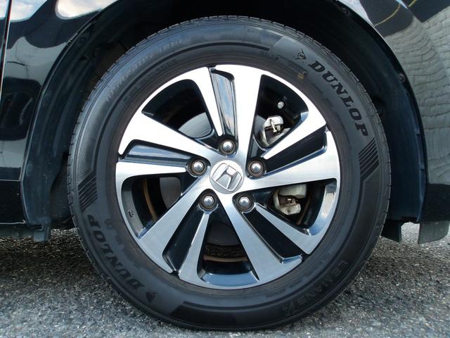 フリードハイブリッド ハイブリッド・ＥＸ　ハーフレザー　フリップダウンモニター　純正メモリナビ　バックカメラ　シートヒーター　両側パワースライドドア　前後ドラレコ　ビルトインＥＴＣ　オートライト　純正１５ＡＷ　ＬＥＤヘッドライト　スマートキー（13枚目）