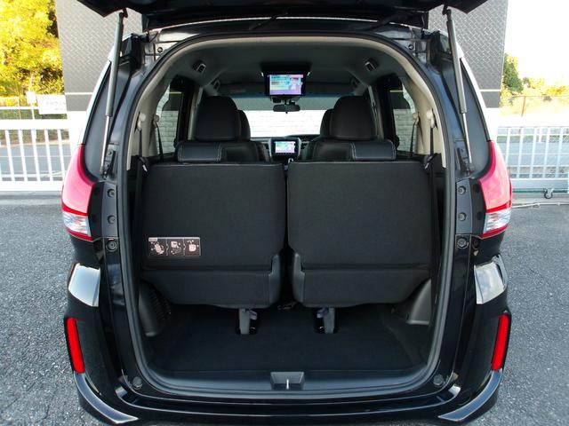 フリードハイブリッド ハイブリッド・ＥＸ　ハーフレザー　フリップダウンモニター　純正メモリナビ　バックカメラ　シートヒーター　両側パワースライドドア　前後ドラレコ　ビルトインＥＴＣ　オートライト　純正１５ＡＷ　ＬＥＤヘッドライト　スマートキー（14枚目）