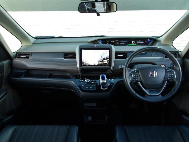 フリードハイブリッド ハイブリッド・ＥＸ　ハーフレザー　フリップダウンモニター　純正メモリナビ　バックカメラ　シートヒーター　両側パワースライドドア　前後ドラレコ　ビルトインＥＴＣ　オートライト　純正１５ＡＷ　ＬＥＤヘッドライト　スマートキー（17枚目）