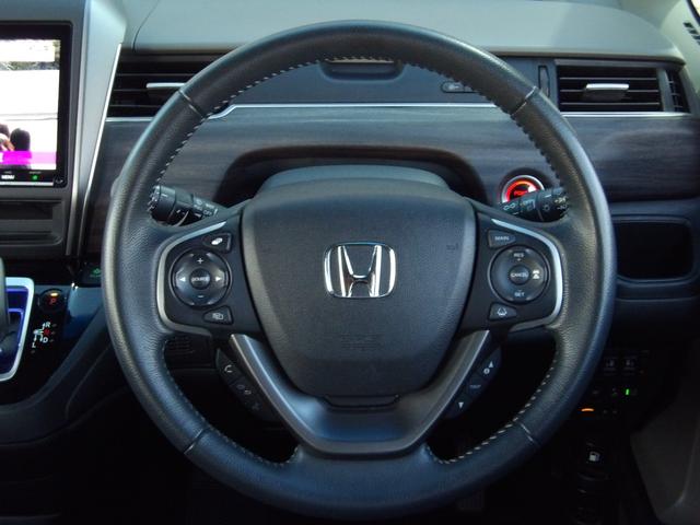 フリードハイブリッド ハイブリッド・ＥＸ　ハーフレザー　フリップダウンモニター　純正メモリナビ　バックカメラ　シートヒーター　両側パワースライドドア　前後ドラレコ　ビルトインＥＴＣ　オートライト　純正１５ＡＷ　ＬＥＤヘッドライト　スマートキー（18枚目）