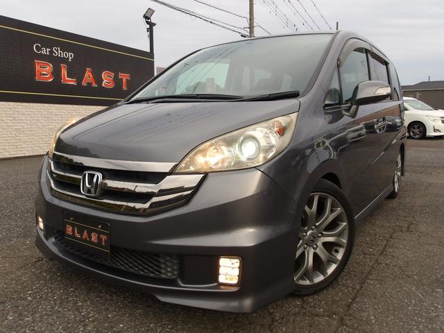 ステップワゴン スパーダS HDDナビ スマートスタイルED ローダウン フリップダウンモニター 7人乗り 両側パワスラ フルセグTV 純正HDDナビ TVキャンセラー 純正18AW バックカメラ スマートキー HIDヘッドライト フォグ(10枚目)