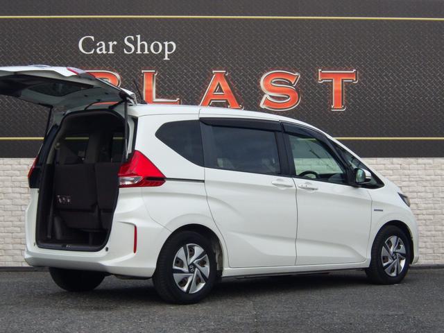 フリードハイブリッド ハイブリッド・Ｇホンダセンシング　純正メモリーナビ　フルセグＴＶ　両側パワスラ　Ｂｌｕｅｔｏｏオーディオ　バックカメラ　ビルトインＥＴＣ　アダプティブクルコン　クリアランスソナー　衝突軽減ブレーキ　ＬＥＤヘッドライト　ＴＶキャンセラー（7枚目）