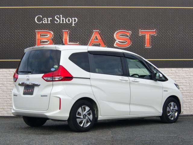 フリードハイブリッド ハイブリッド・Ｇホンダセンシング　純正メモリーナビ　フルセグＴＶ　両側パワスラ　Ｂｌｕｅｔｏｏオーディオ　バックカメラ　ビルトインＥＴＣ　アダプティブクルコン　クリアランスソナー　衝突軽減ブレーキ　ＬＥＤヘッドライト　ＴＶキャンセラー（9枚目）