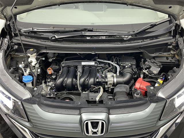 フリード Ｇ・ホンダセンシング　４ＷＤ　寒冷地　ホンダセンシング　アダプティブクルーズコントロール　横滑り防止装置　レーンキープアシスト　純正ナビ　バックカメラ　純正フリップダウンモニター　両側パワースライドドア　前席シートヒーター（5枚目）